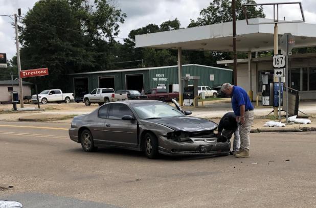 Vehicle Wreck at Four-Way Stop, No Injuries