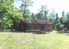 County Dismantles Hamp Williams Cabin